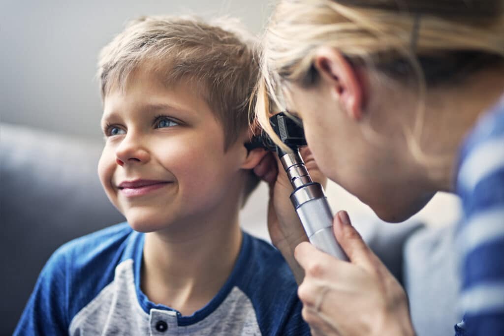 boy getting an ear exam